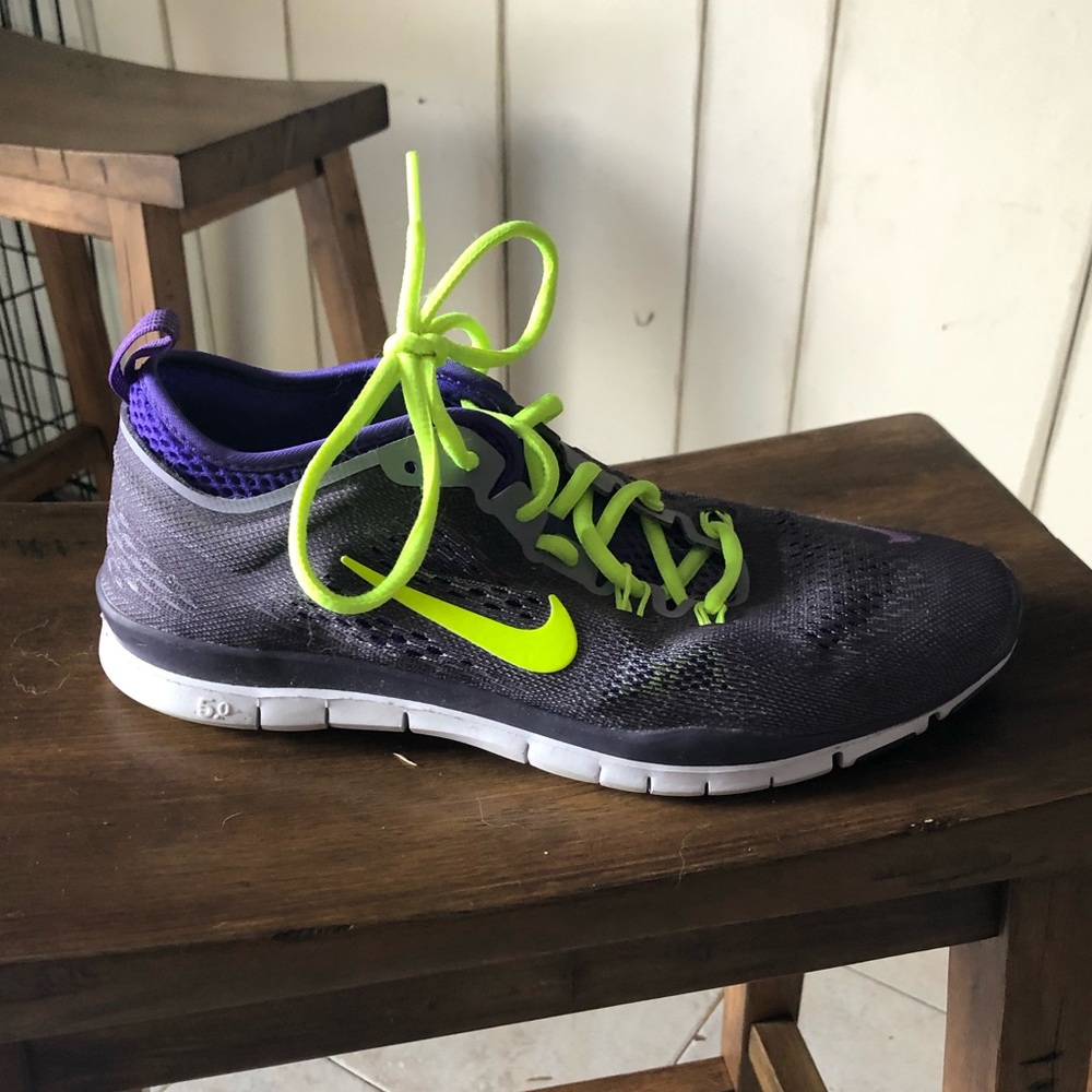 Purple, neon green, & gray Nike Free Run shoes